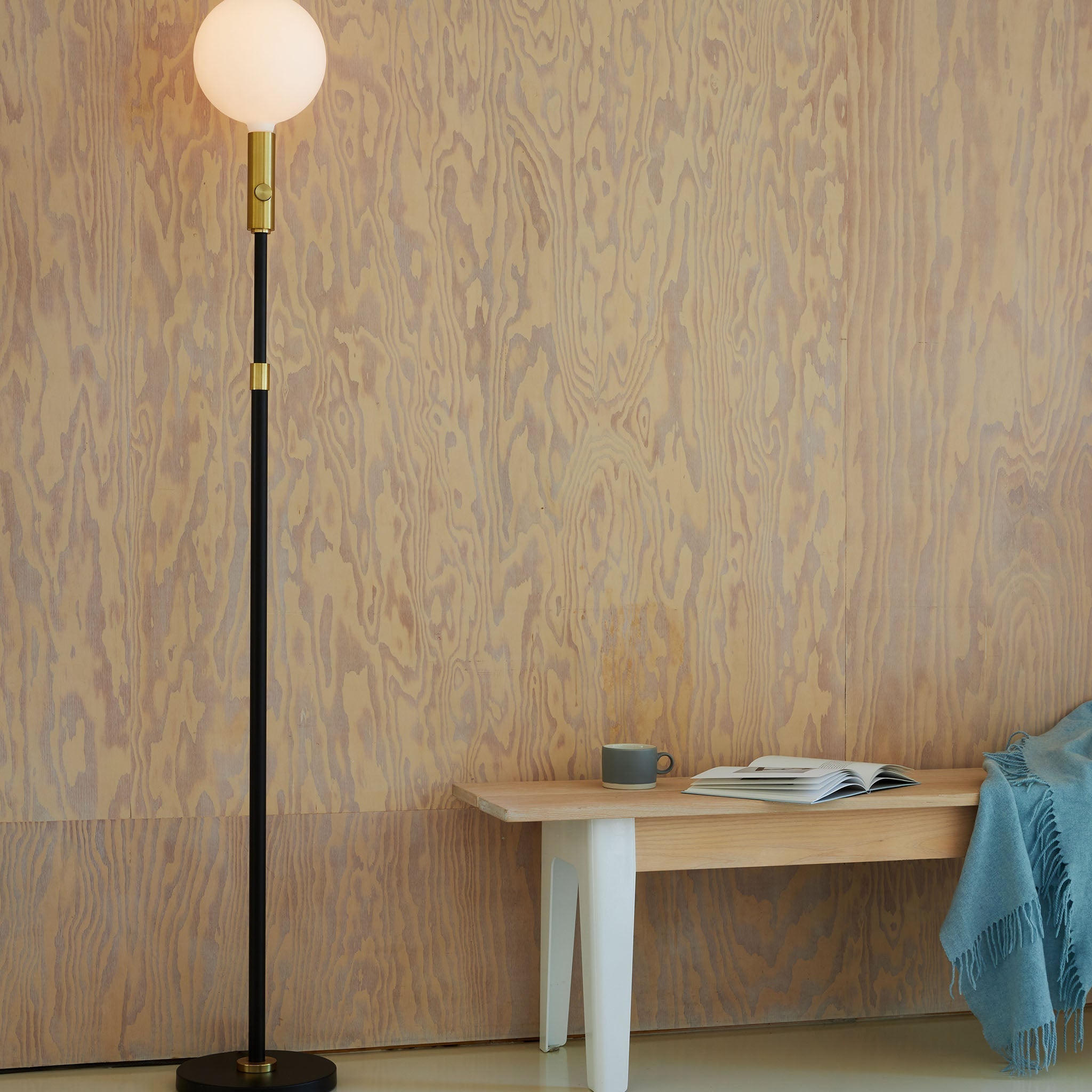 Tala Poise Adjustable Floor Lamp in Brass + Sphere V in a styled interior setting (view 6)