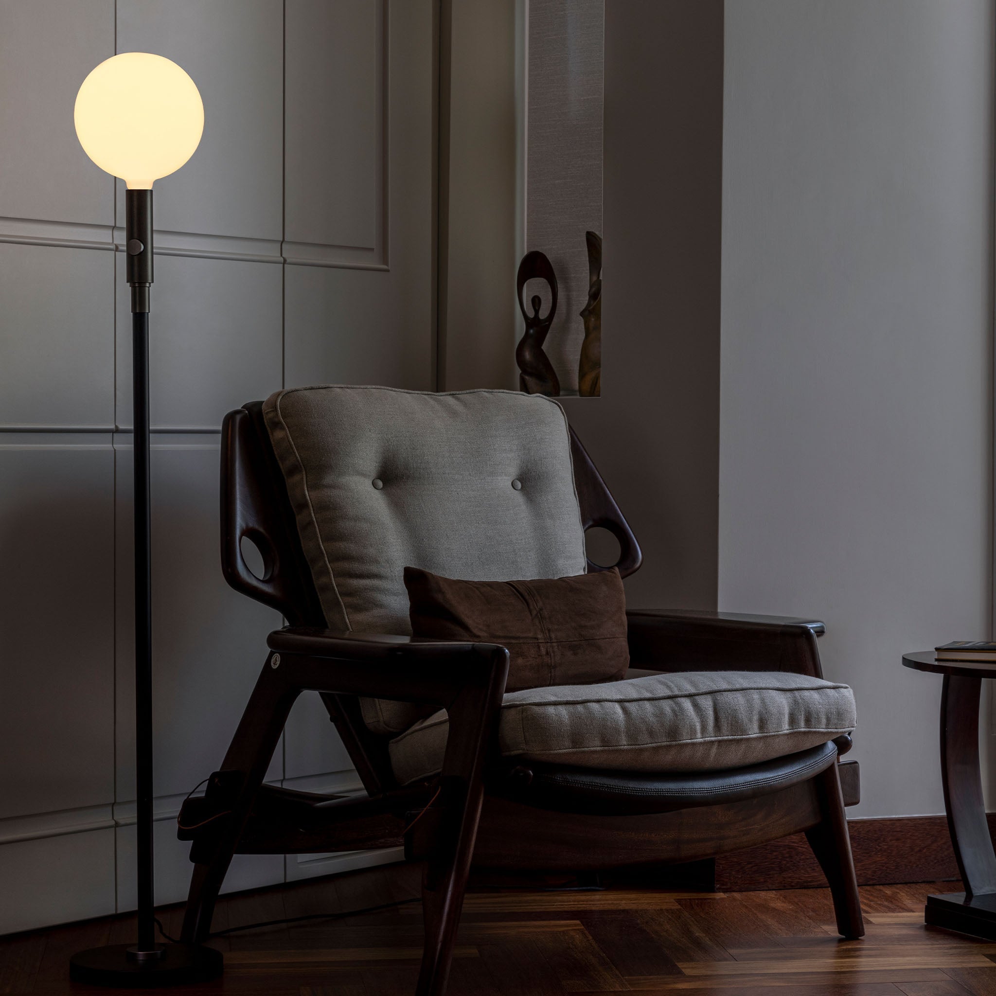 Tala Poise Adjustable Floor Lamp in Graphite + Sphere V in a styled interior setting (view 5)