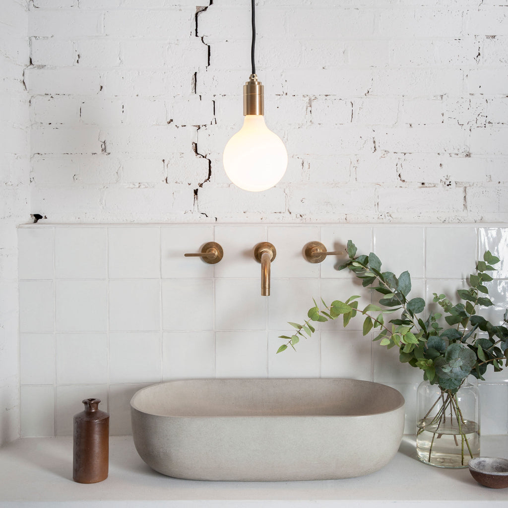 Tala Porcelain III Pendant Light in Walnut in a styled interior setting