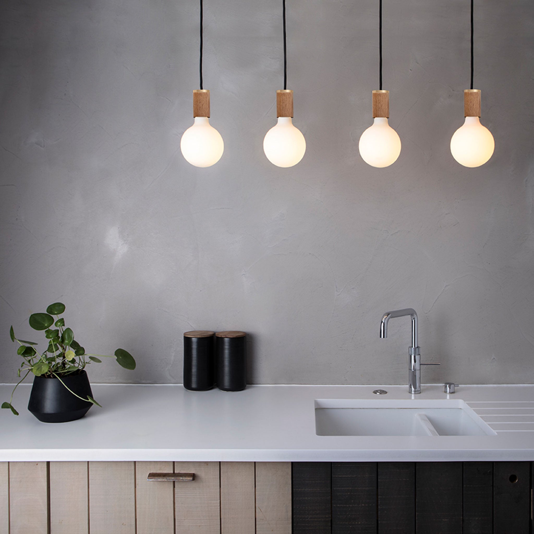 Tala Porcelain III Pendant Light in Oak in a styled interior setting