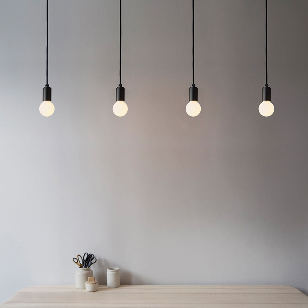 Tala Porcelain II Pendant Light in Graphite in a styled interior setting