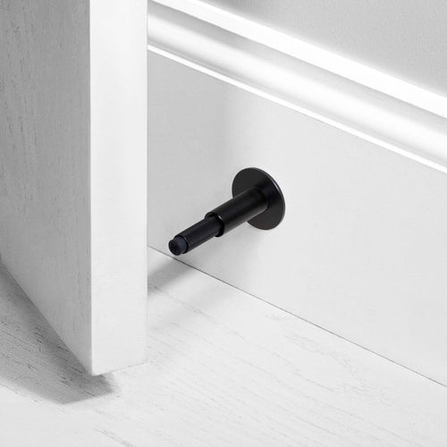 Buster + Punch Door Stop Wall Cross in Black