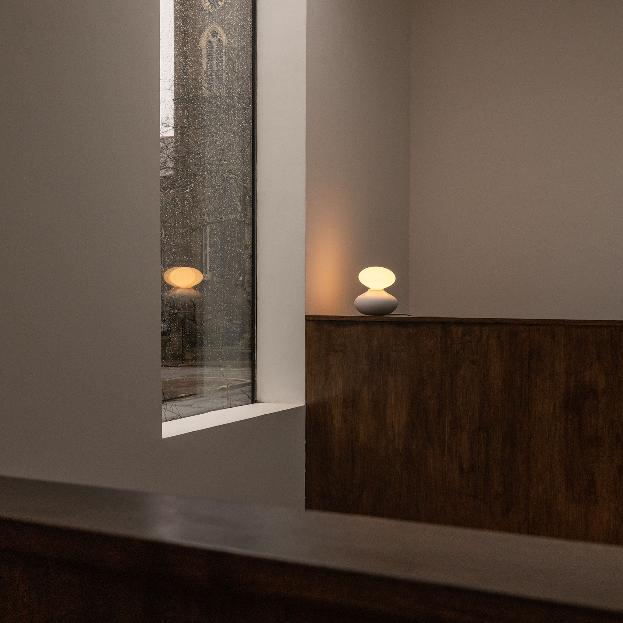 Tala Reflection Oval Table Lamp in a styled interior setting