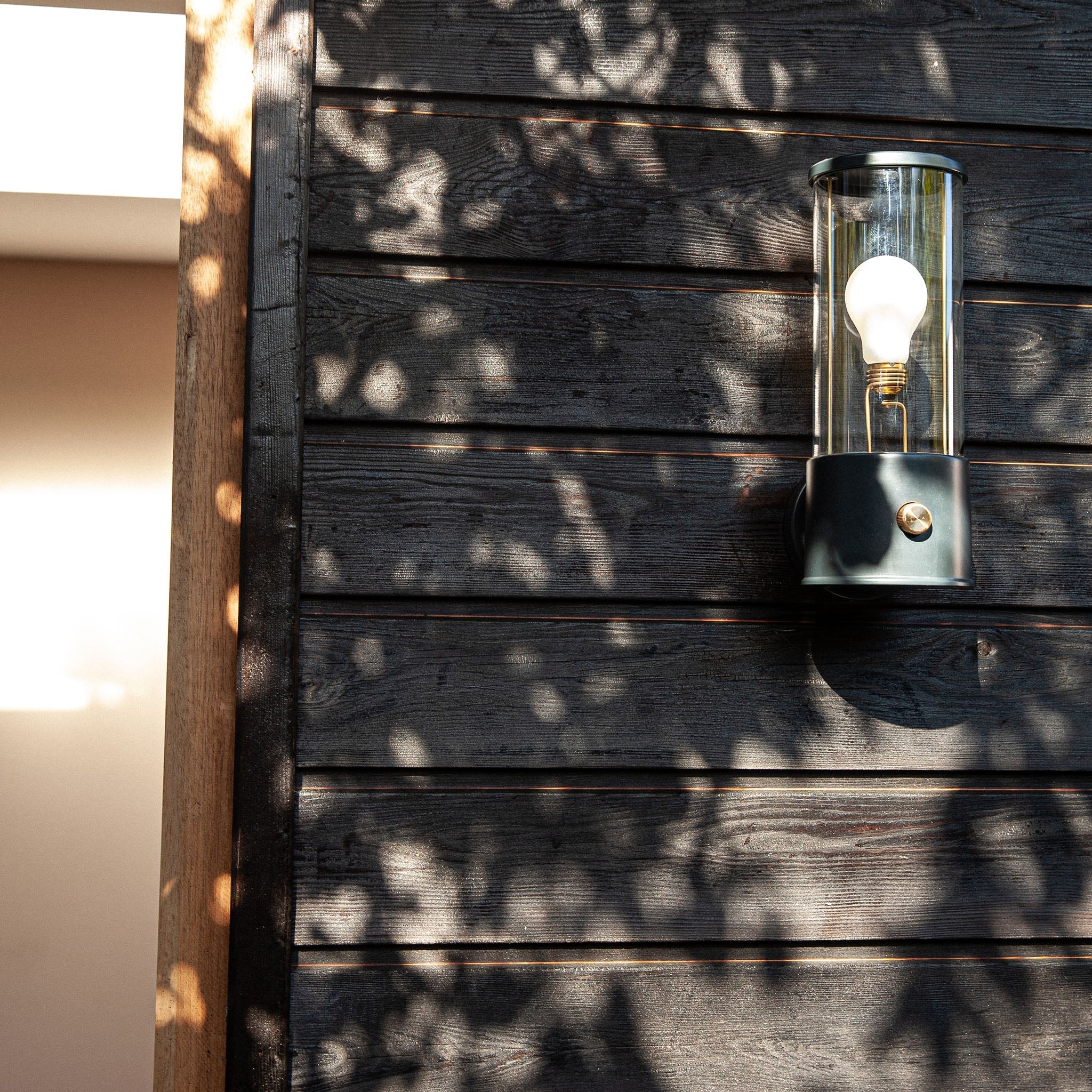 Tala The Muse Wall Light in Hackles Black in a styled interior setting (view 2)
