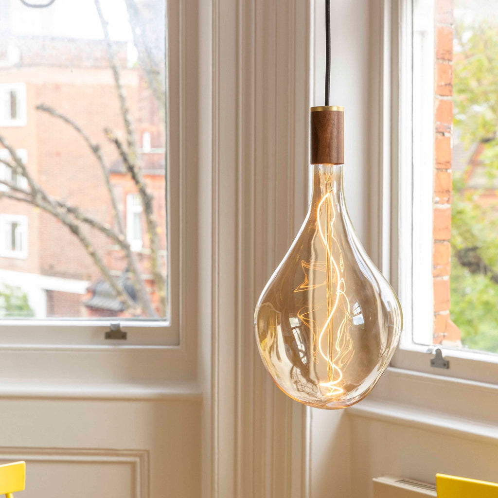 Tala Voronoi III Pendant Light in Walnut in a styled interior setting