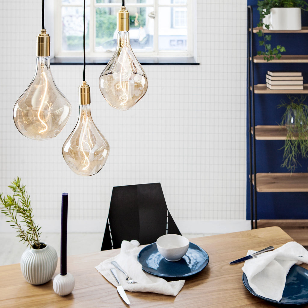 Tala Triple Pendant in Brass + Voronoi II in a styled interior setting (view 2)