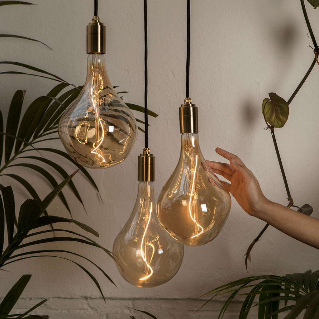 Tala Triple Pendant in Brass + Voronoi II in a styled interior setting