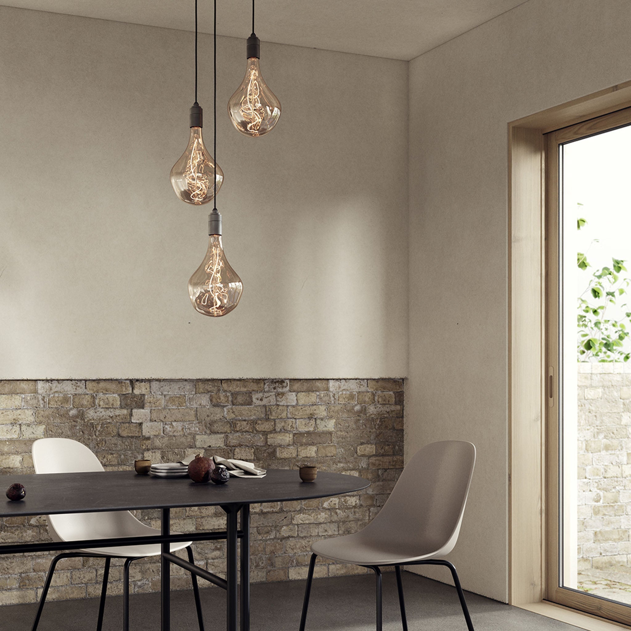 Tala Triple Pendant in Graphite - Black Canopy in a styled interior setting