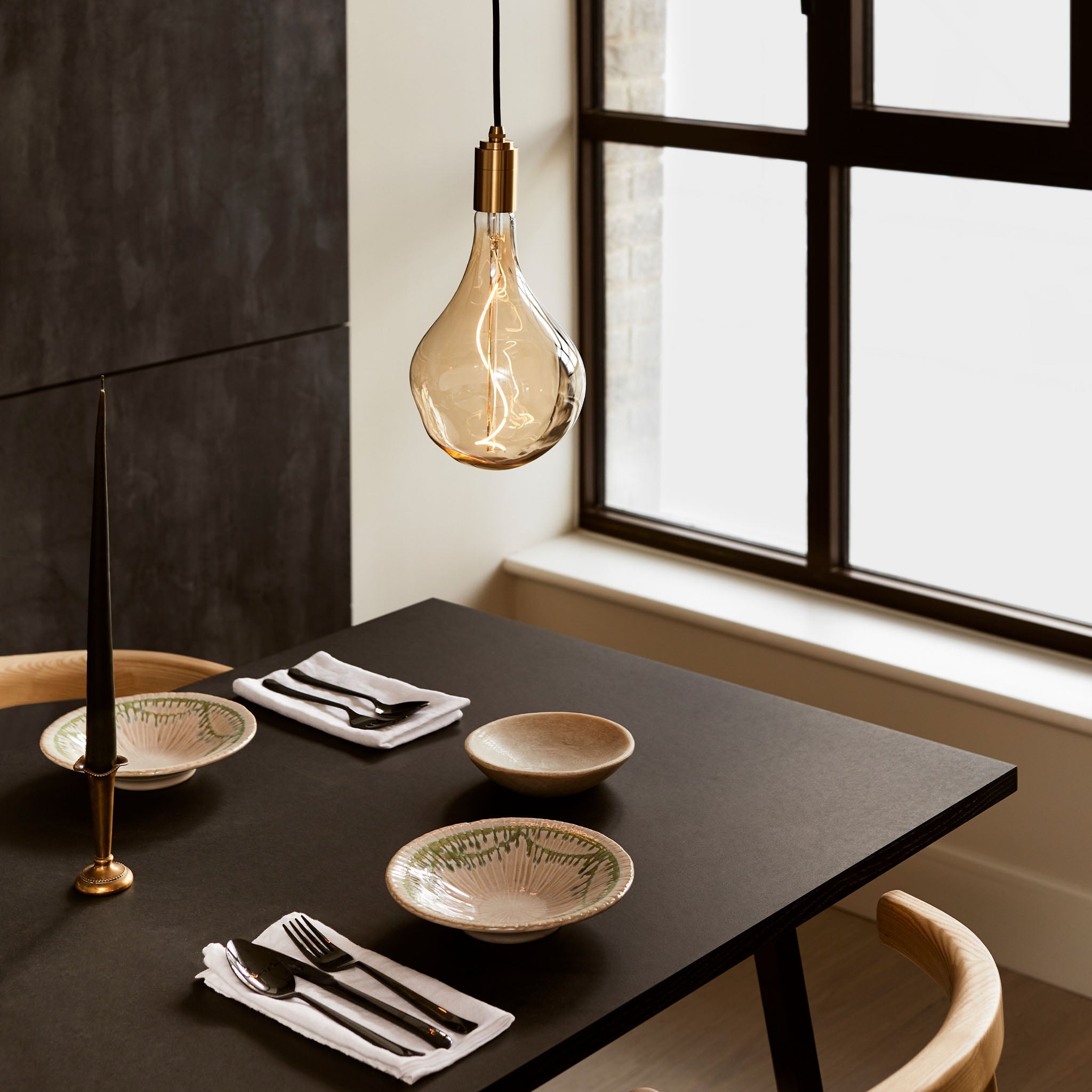 Tala Brass Pendant in a styled interior setting